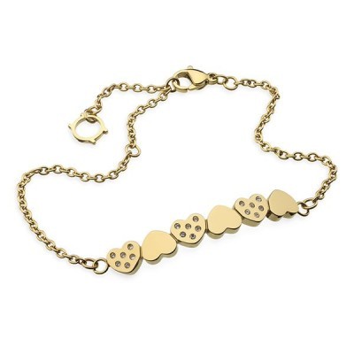 Pulseira dourada com pendentes em forma de coração