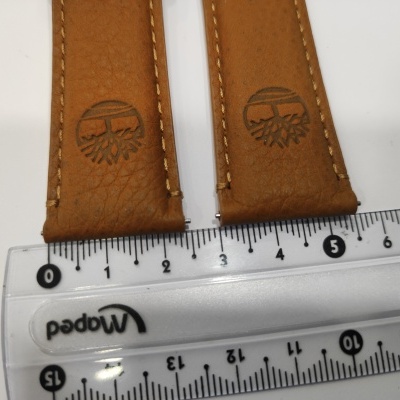 Braceletes de relógio em pele castanha com régua branca