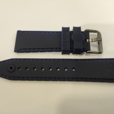 Correia para relógio azul escuro com fivela metálica e textos em relevo