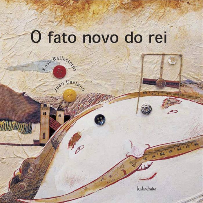 O fato novo do rei Capa de livro 'O fato novo do rei' com ilustração artística e botões coloridos