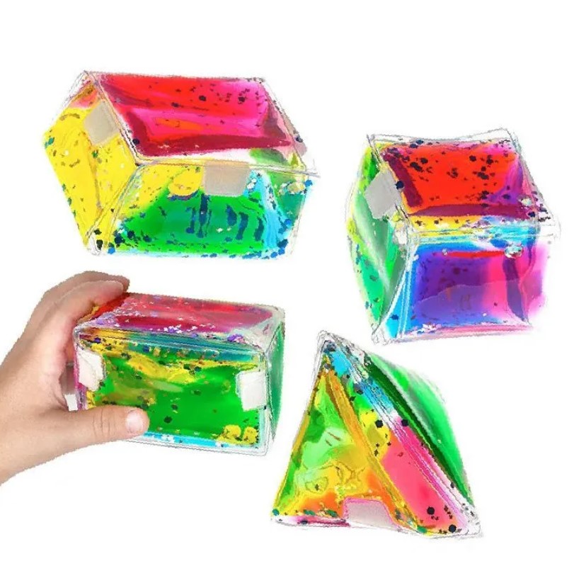 Jelly 3D Shapes – Conjunto de 4 Formas Geométricas Sensoriais Cubos flexíveis transparentes coloridos com líquido e partículas dentro
