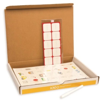 Conjunto educativo IOËO com adesivos, figuras coloridas e canetas dentro de embalagem de cartão