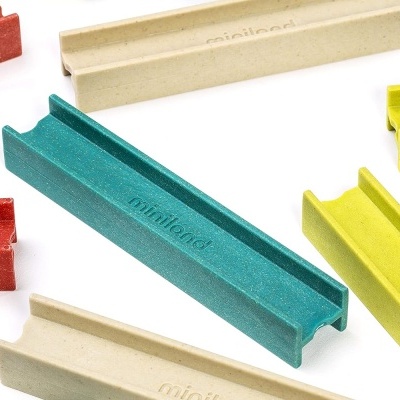 Barras coloridas texturizadas com o texto miniload em relevo