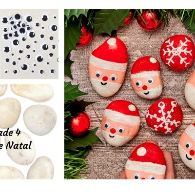 Pedras decoradas com motivos de Natal, rostos de Papai Noel e bolas vermelhas com desenhos brancos em fundo de madeira e pinheiro