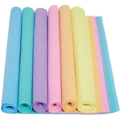 Rolos coloridos em tons pastel alinhados lado a lado