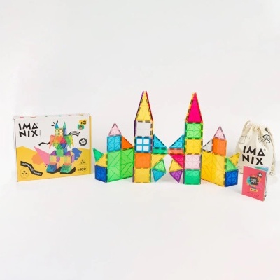 Blocos magnéticos IMANIX coloridos em vários formatos com embalagem e manual, sobre fundo branco
