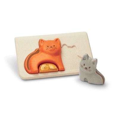 Quebra-cabeças de gato em peças de cor laranja e cinza numa base creme