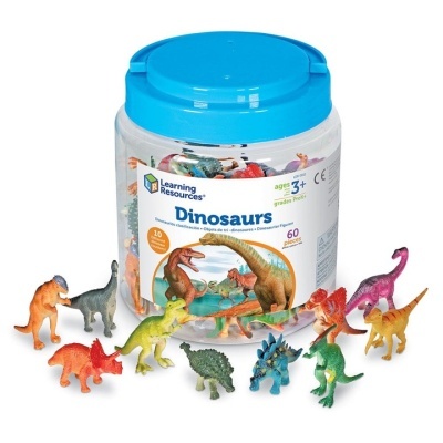 Frasco de brinquedos de dinossauros coloridos com tampa azul e rótulo branco