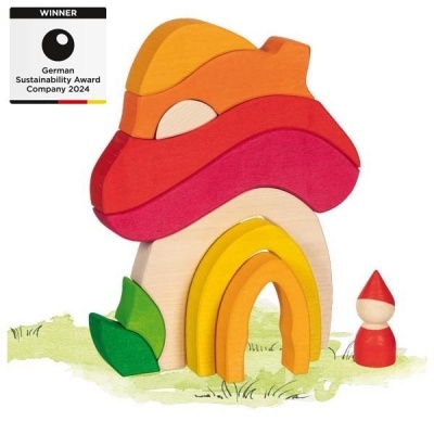 Brinquedo de madeira colorido em forma de cogumelo com figura humana pequena e selo de prémio