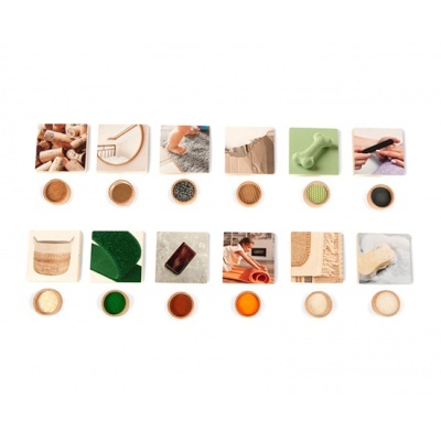 Diferentes materiais e texturas organizados em quadrados com círculos coloridos em baixo