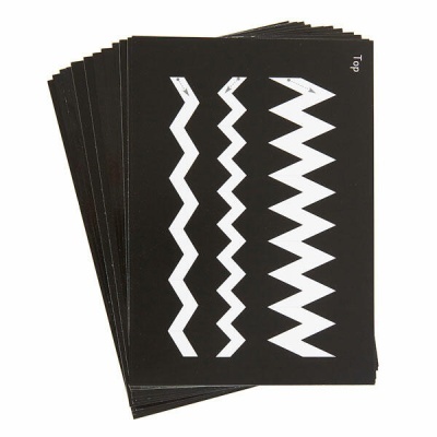 Cartões pretos com padrões de setas brancas em zigzag e texto 'Top' no canto superior direito.