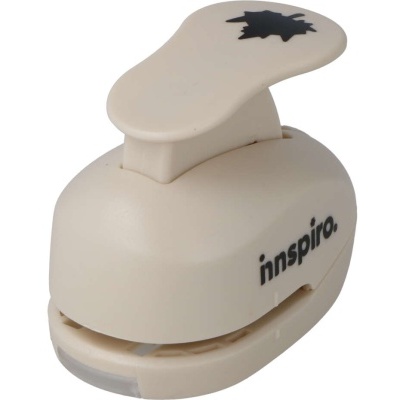 Recortador de papel bege claro com padrão estrela e marca innspiro.