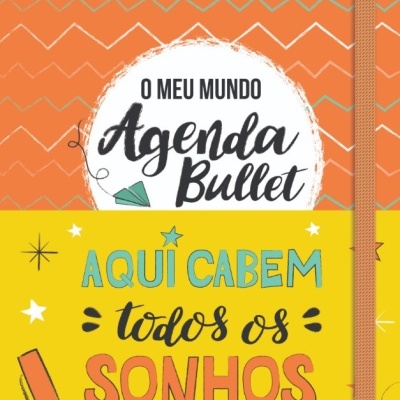 Capa de agenda Bullet laranja e amarelo com texto e elástico laranja