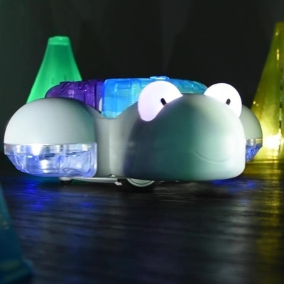 Brinquedo tartaruga iluminado em plástico azul translúcido e cinza