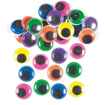 Olhos de plástico multicoloridos com pupila preta sobre fundo branco