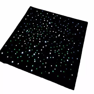 Toalha preta com pontos brilhantes coloridos