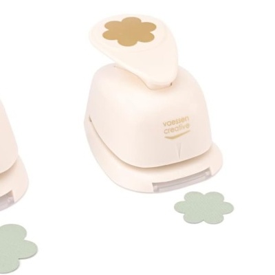 Três perfuradores de papel creme com forma de flor cortada e marca VOSSIER CREATION