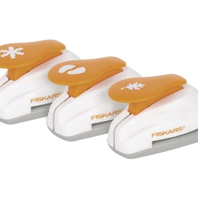 Três furadores de papel FISKARS branco e laranja com símbolos decorativos.