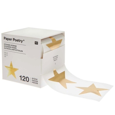 Caixa branca de autocolantes de estrelas douradas em rolo