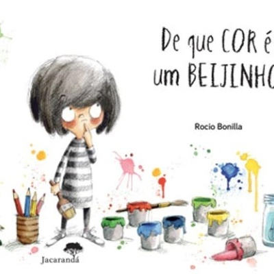 Capa de livro infantil com criança e tintas coloridas