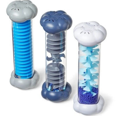 Três tubos sensoriais plásticos com tampas florais e objetos móveis azuis no interior