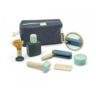 Conjunto de acessórios de cuidados pessoais infantis com bolsa azul escura.