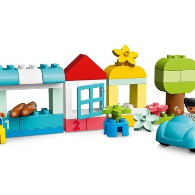 Conjunto de blocos de construção coloridos com figuras, carrinho, pães, flores e árvore
