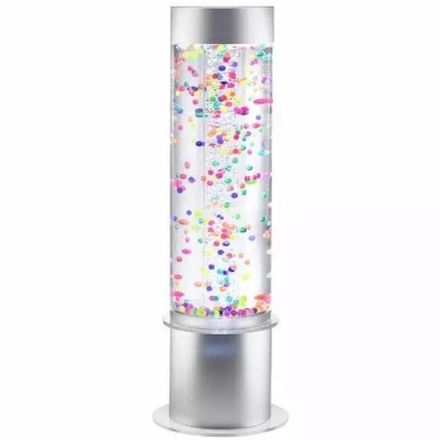 Lâmpada tipo lava lamp com partículas coloridas num cilindro transparente