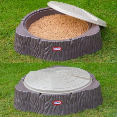 Areiaira infantil redonda com tampa branca e base castanha em relva