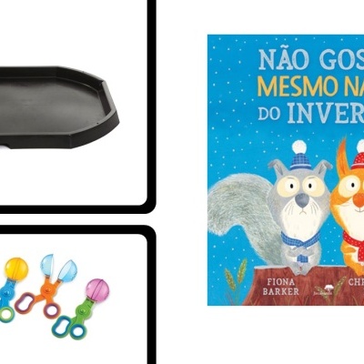 Bandeja preta, chocalhos coloridos e capa de livro infantil azul com texto