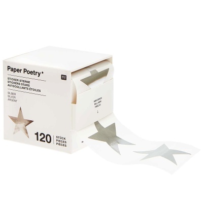 Caixa branca com autocolantes em estrela prateada