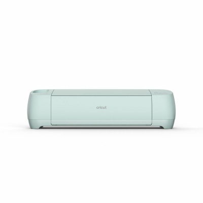 Máquina de corte Cricut verde água em fundo branco