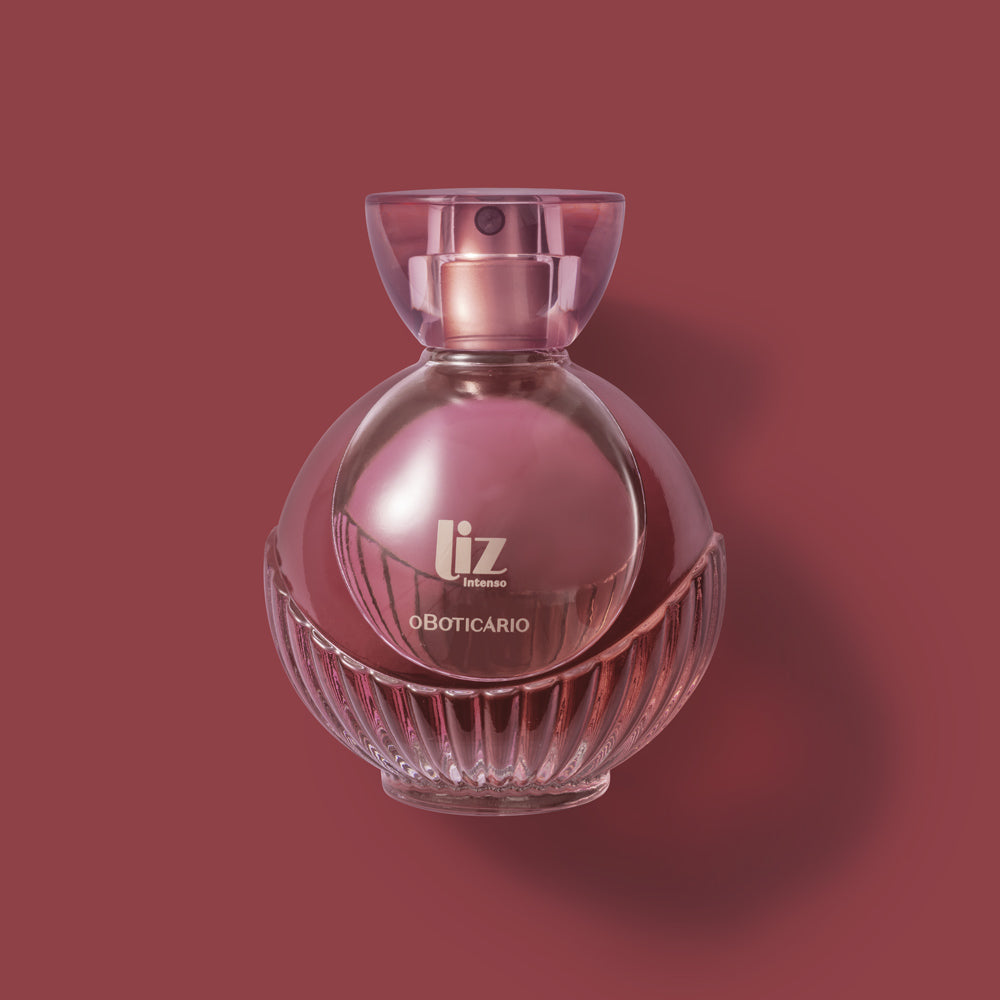 Frasco de perfume Liz Intenso da O Boticário em vidro rosa com tampa transparente