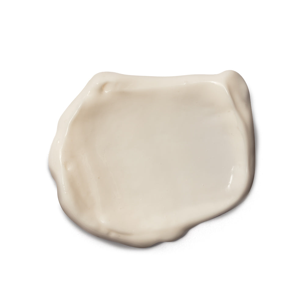 Botik Vitamina C Multiprotetor Gel Creme FPS50 40g Pingo de creme branco com textura lisa e brilhante