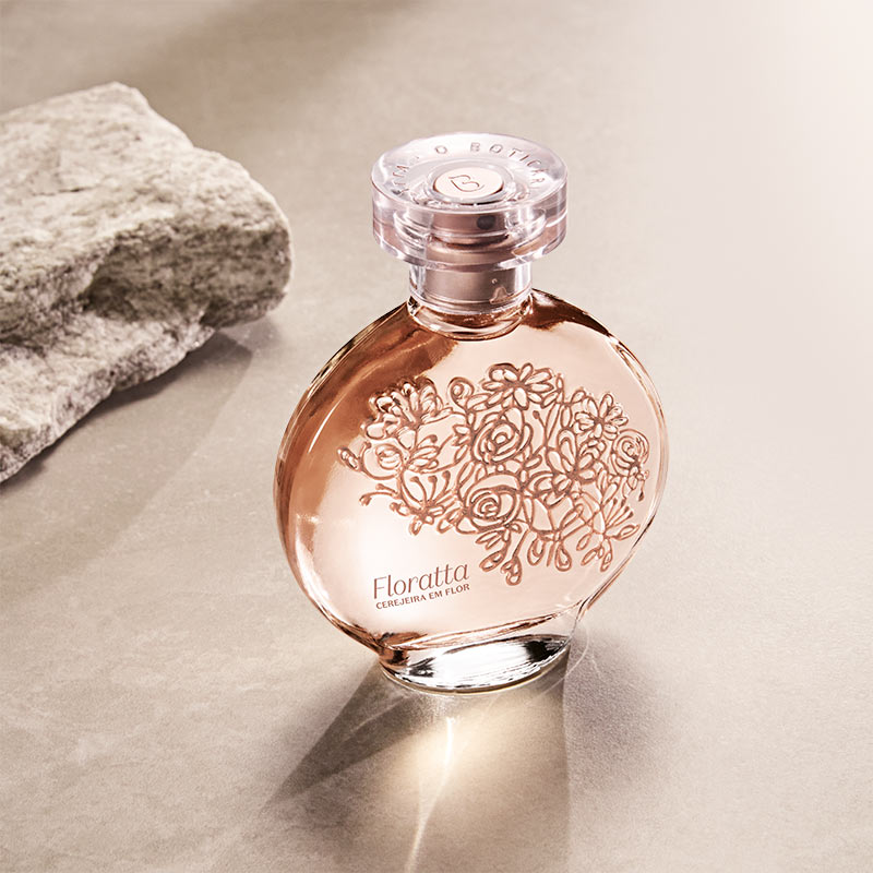 frasco de perfume Floratta com design floral em relevo