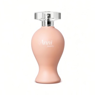 Frasco de perfume rosa fosco com tampa transparente e texto Anni sweetly