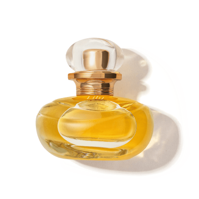 Frasco de perfume amarelo em vidro com tampa transparente e detalhes dourados