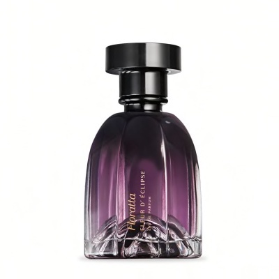 Frasco de perfume roxo com tampa preta e texto dourado