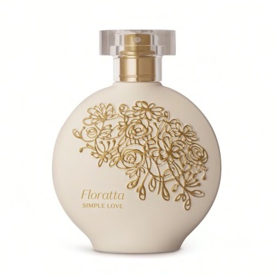 Frasco redondo de perfume bege com padrão dourado floral e tampa transparente