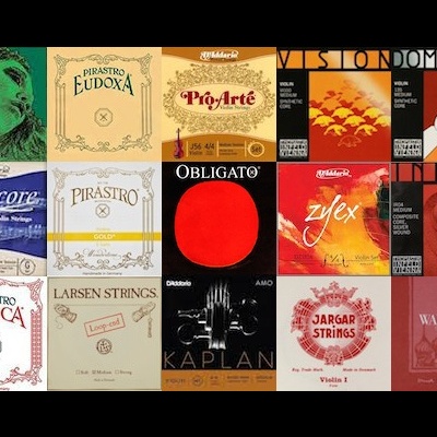 Embalações coloridas de cordas para instrumentos musicais com várias marcas e textos.