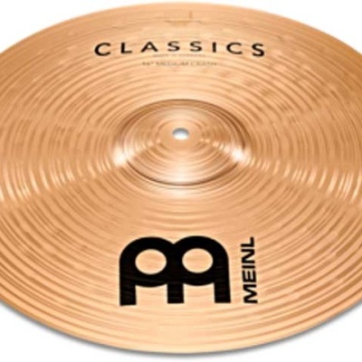 Prato de percussão dourado com texto CLASSICS BY MEINL