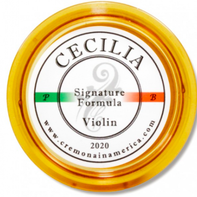 Lata amarela com arame para violino e etiqueta com texto