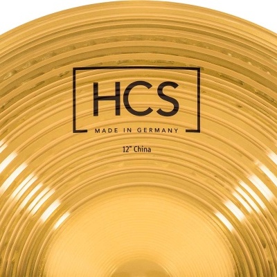 Prato musical dourado com marca HCS e texto MADE IN GERMANY