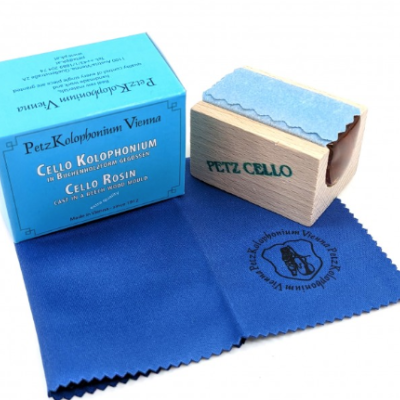 Kit para violoncelo Petz Kolophonium Vienna com caixa azul, bloco de madeira e pano azul.