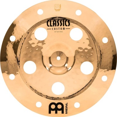 Prato de bateria em bronze com buracos circulares e texto CLASSICS CUSTOM e MEINL