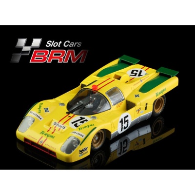 Modelo de carro de slot amarelo com número 15 e marcas como Tergal e Shell