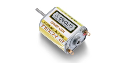 Motor elétrico pequeno de metal com rótulo branco e amarelo