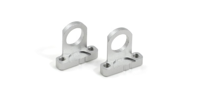 Dois suportes metálicos prateados com orifício circular e base com parafusos em fundo branco.