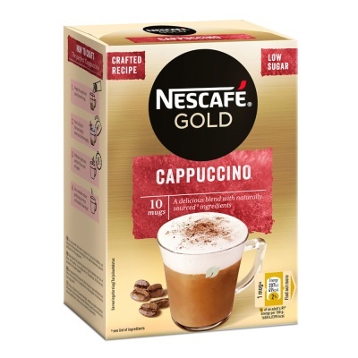 Embalagem dourada e vermelha de cápsulas Nescafé Gold Cappuccino com imagem de cappuccino e grãos de café.