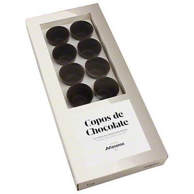 Caixa branca com oito copos de chocolate negro visíveis através de janela transparente